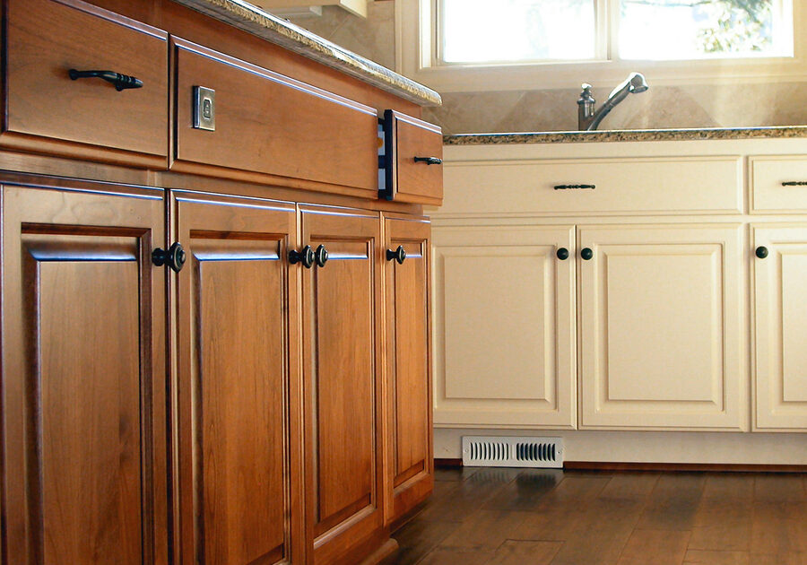 A run of custom alder kitchen cabinets and painted cabinets